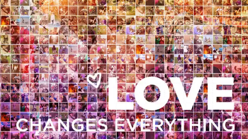 A mosaic of pet adoption photos behind the words Love Changes Everything, from our Petco Love adoption campaign.