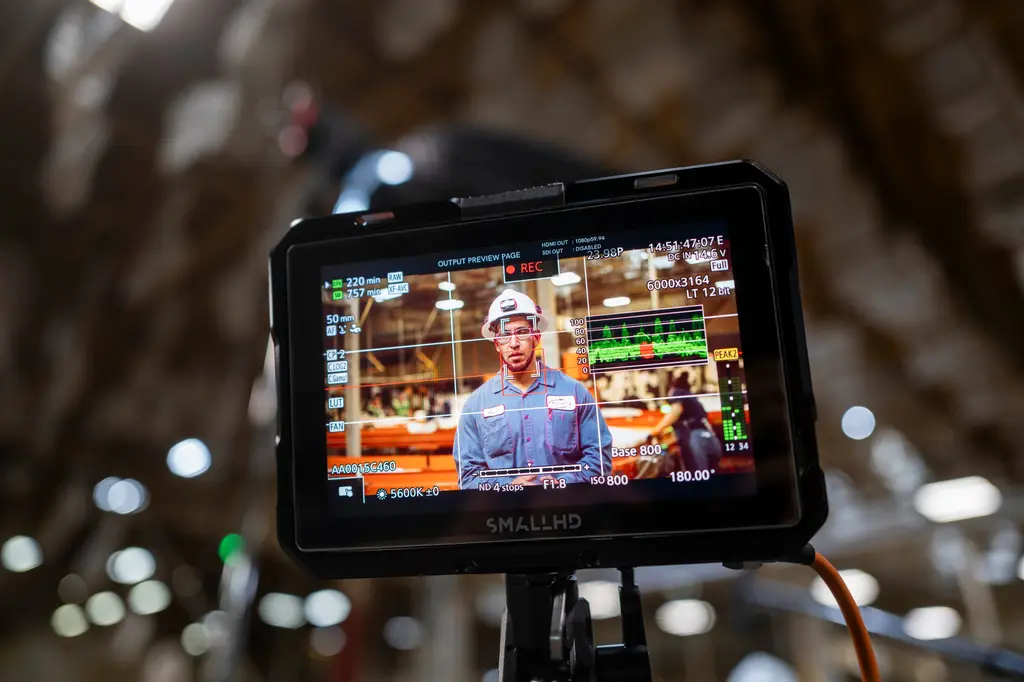 A camera monitor records TX Fast Track graduate Aaron Edgley's interview on the Avanzar factory floor.